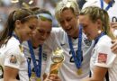 US Women's Soccer Team With FIFA Women's World Cup Trophy